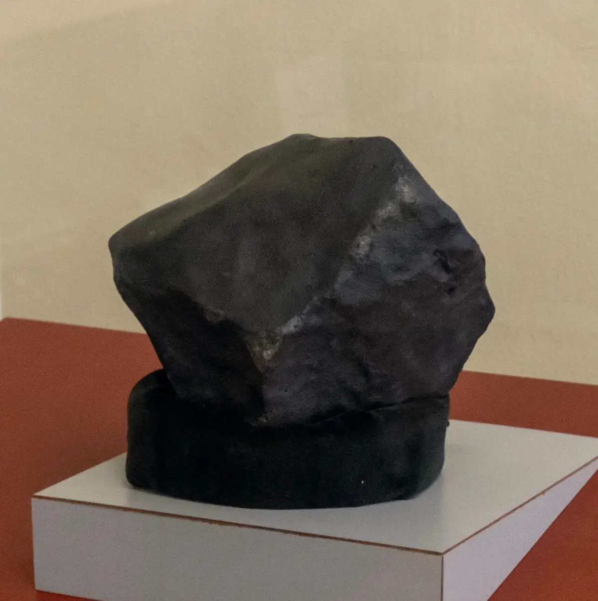 The fragment that struck Ann Hodges, in its case at the Alabama Museum of Natural History