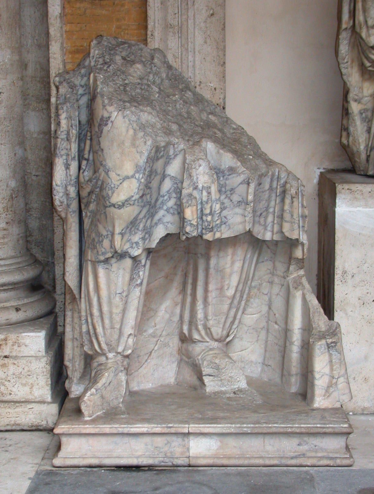 Lower part of a statue of a Dacian carved in pavonazzetto (Capitoline Museums, Rome)