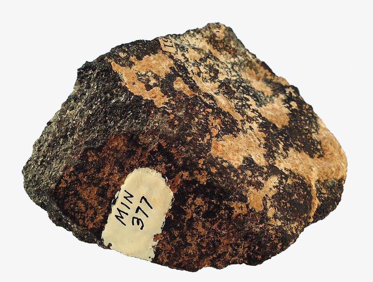 A sample of emery: a black, granular, compact mass