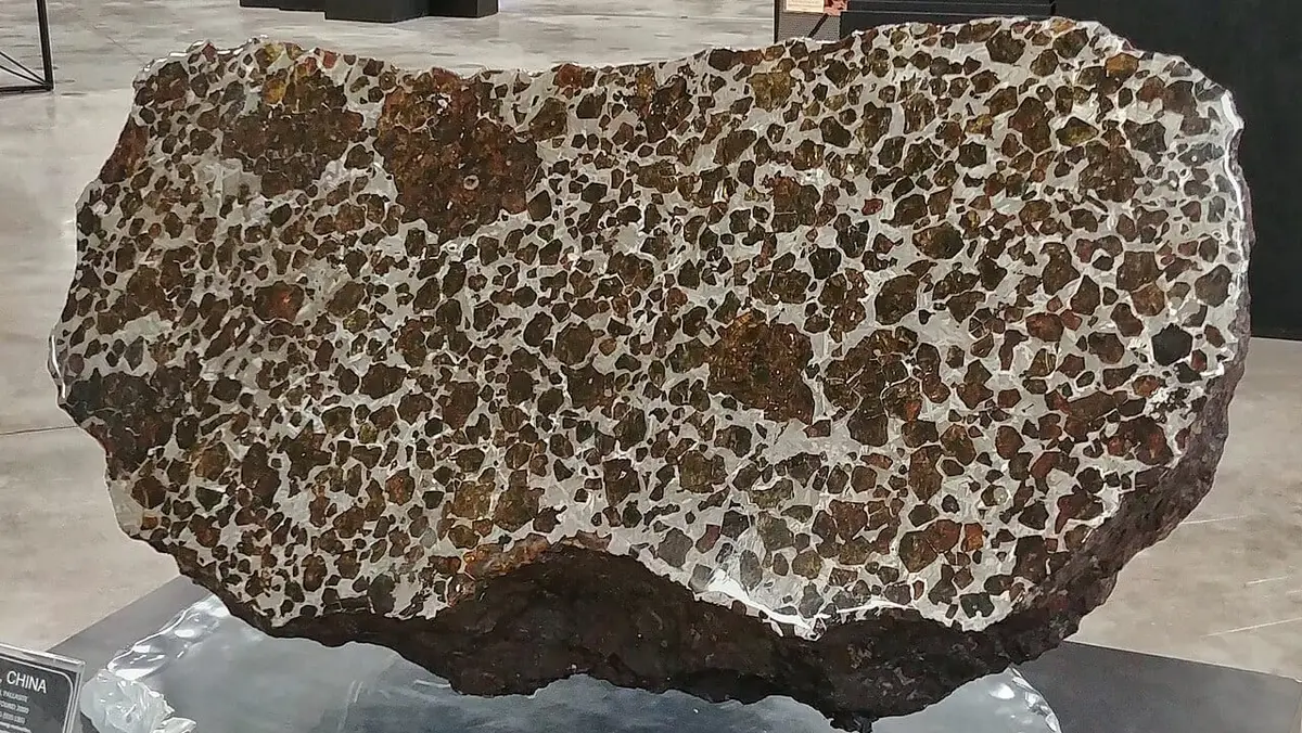 The main mass of the Fukang meteorite on display at the University of Arizona