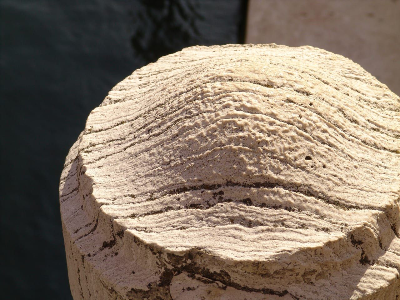 A weathered baluster of Istrian stone in Venice
